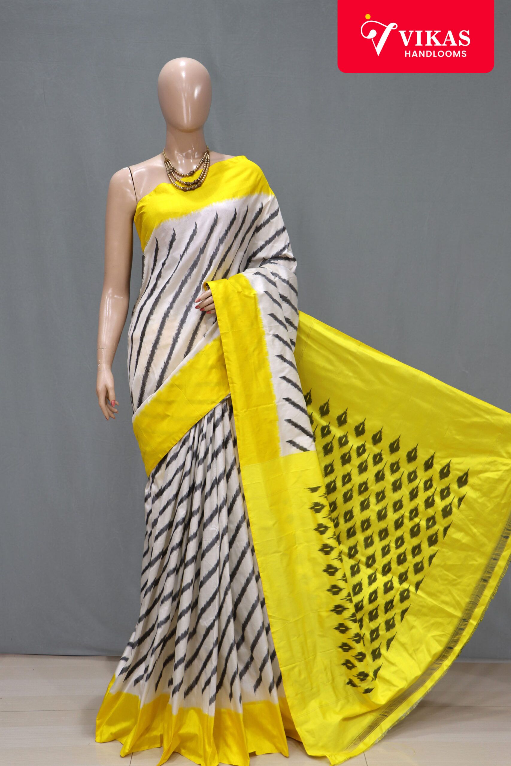 Pochampally Yellow Border SareePochampally Yellow Border Saree